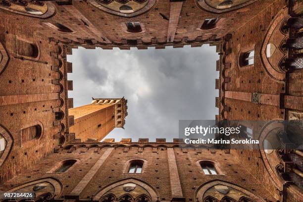 the palazzo pubblico in siena, italy. - palazzo pubblico stock pictures, royalty-free photos & images