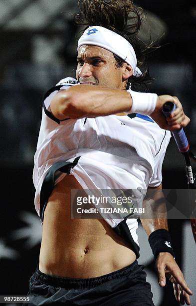 Spanish David Ferrer returns a ball to Potito Starace of Italy during the ATP Tennis Rome Masters tournament on April 28, 2010 in Rome. AFP PHOTO /...