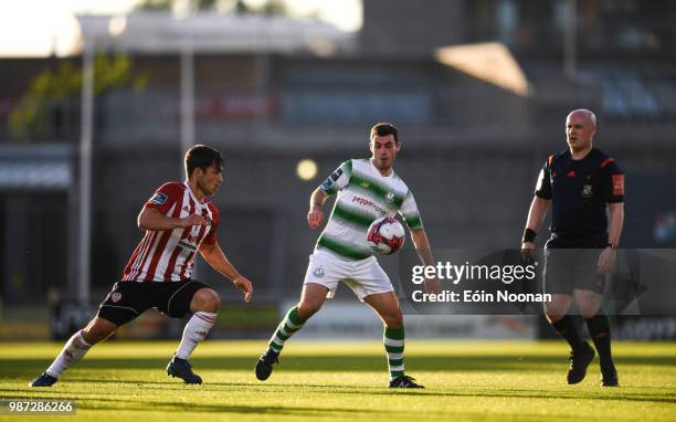 Dublin , Ireland - 29 June 2018; Joel Coustrain of Shamrock Rovers in action against Jack Doyle of Derry City during the SSE Airtricity League...