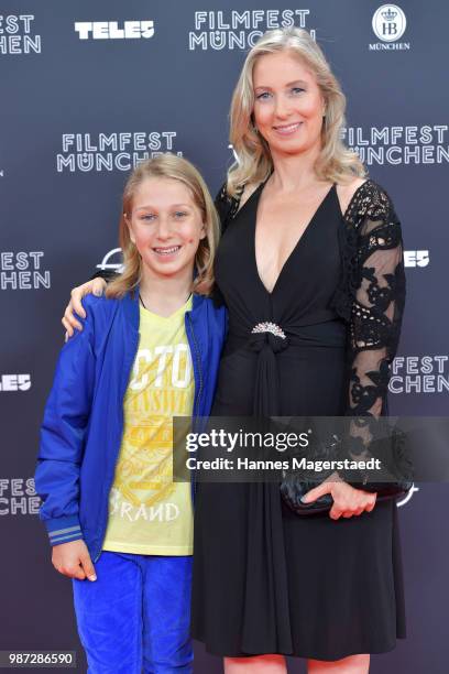 Lara Juliette Sanders and her son Luca Lombardo attend the premiere of the movie 'Das schoenste Maedchen der Welt' of Munich Film Festival 2018 at...