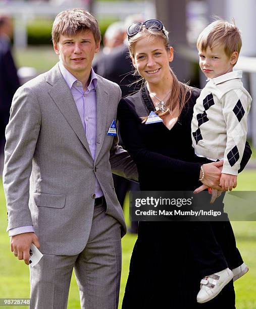 Arsenal FC player Andrey Arshavin, wife Yulia Arshavin and son Artyom Arshavin attend the Moss Bros Raceday horse racing meet on April 28, 2010 in...