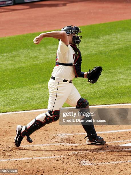 Catcher Mike Redmond of the Cleveland Indians throws the ball to second base during a game on April 12, 2010 against the Texas Rangers at Progressive...