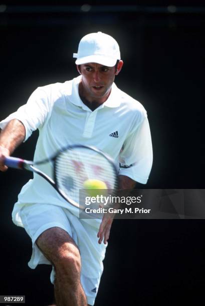 Jamie Delgado of Great Britain in his match against Andrei Medvedev of the Ukraine during the men's first round of The All England Lawn Tennis...