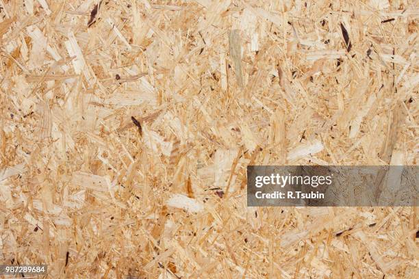 recycled compressed wood chippings board background - plywood texture layers stock pictures, royalty-free photos & images