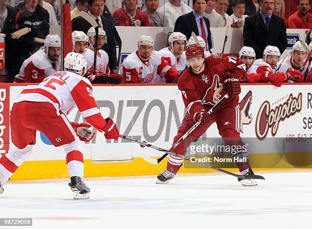 Radim Vrbata of the Phoenix Coyotes tries to pass the puck past Niklas Kronwall of the Detroit Red Wings in Game Seven of the Western Conference...