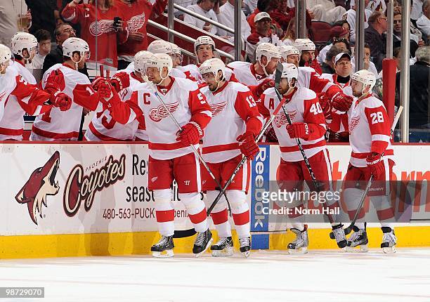 Nicklas Lidstrom, Pavel Datsyuk, Henrik Zetterberg and Brian Rafalski of the Detroit Red Wings celebrate a goal against the Phoenix Coyotes with...
