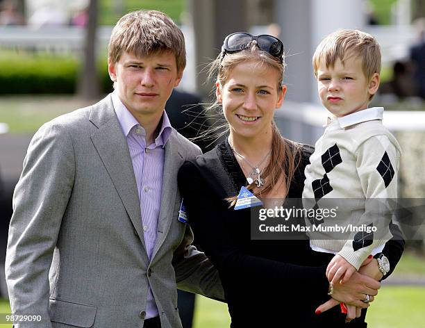 Arsenal FC player Andrey Arshavin, wife Yulia Arshavin and son Artyom Arshavin attend the Moss Bros Raceday horse racing meet on April 28, 2010 in...