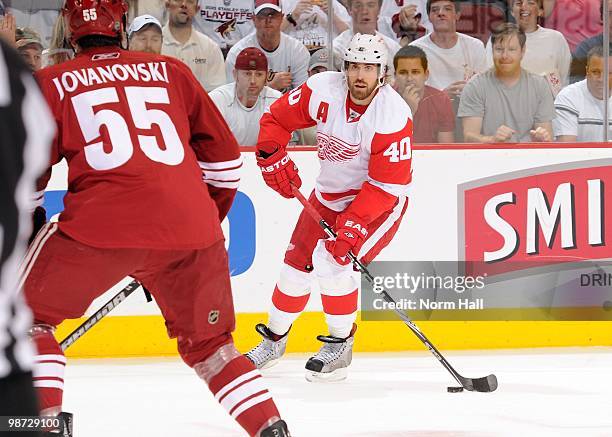 Henrik Zetterberg of the Detroit Red Wings skates the puck up ice against the Phoenix Coyotes in Game Seven of the Western Conference Quarterfinals...