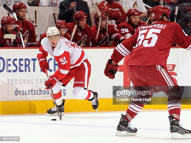 Valtteri Filppula of the Detroit Red Wings skates the puck up ice along the boards against the Phoenix Coyotes in Game Seven of the Western...