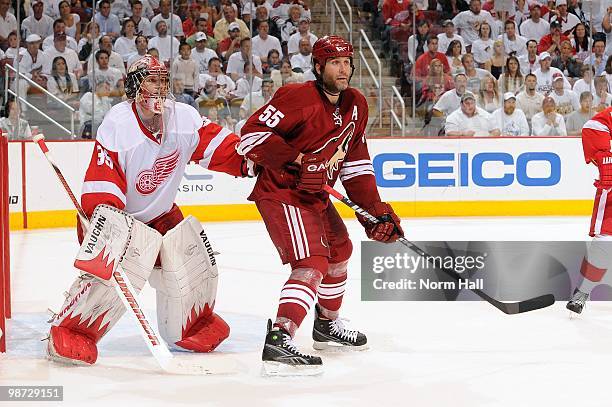 Ed Jovanovski of the Phoenix Coyotes tries to screen Goaltender Jimmy Howard of the Detroit Red Wings in Game Seven of the Western Conference...