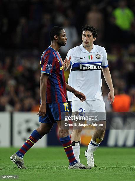 Seydou Keita of FC Barcelona refuses to shake the hand of Diego Milito of Inter Milan at the end of the UEFA Champions League semi final second leg...