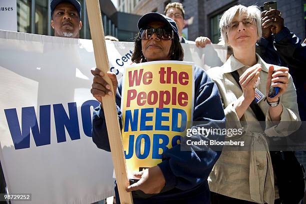 Protesters pushing for financial reform demonstrate outside the headquarters of Bank of America Corp. During the company's annual shareholders...