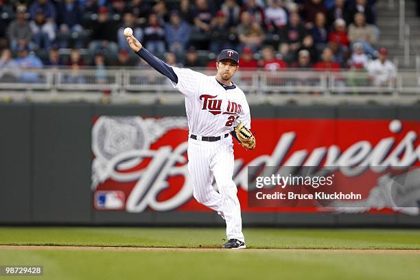 Hardy of the Minnesota Twins fields a ball against the St. Louis Cardinals on April 2, 2010 at Target Field in Minneapolis, Minnesota. The Cardinals...