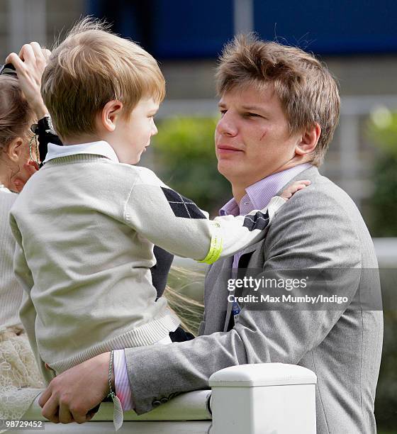 Arsenal FC player Andrey Arshavin and son Artyom Arshavin attend the Moss Bros Raceday horse racing meet on April 28, 2010 in Ascot, England.