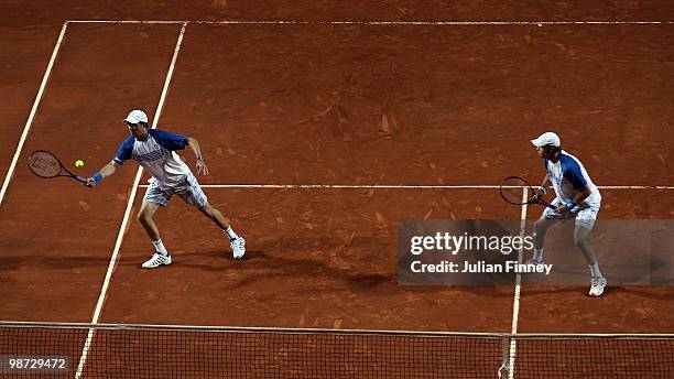 Bob and Mike Bryan of USA in action in their doubles match against Frantisek Cermak of Czech Republic and Michal Mertinak of Slovakia during day four...