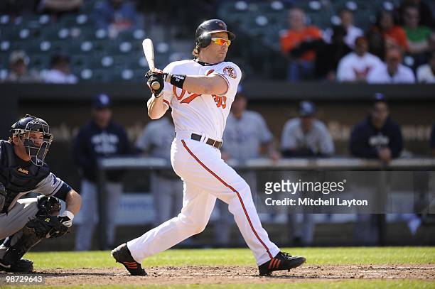 Luke Scott of the Baltimore Orioles takes a swing during a baseball game against the Tampa Bay Rays on April 14, 2010 at Camden Yards in Baltimore,...