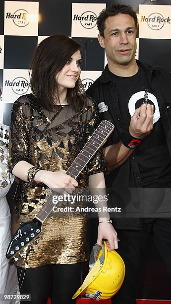 Singer Amy Macdonald and singer 'Evil' Jared Hennagan attend the Hard Rock Cafe Berlin re-opening on April 28, 2010 in Berlin, Germany.