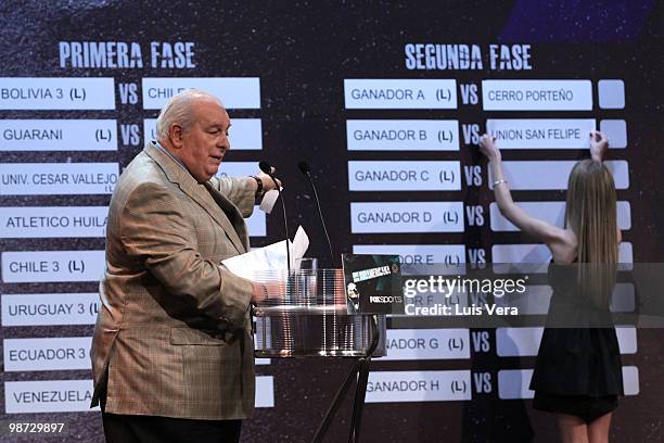 S General Secretary General Eduardo de Luca shows a stripe with a team name during the draw of the 2010 Nissan Sudamericana Cup at Conmebol...