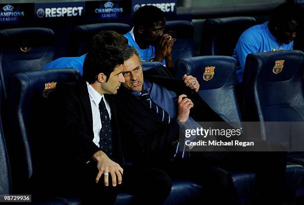 Inter Milan manager Jose Mourinho talks to Luis Figo on the bench before the UEFA Champions League Semi Final Second Leg match between Barcelona and...