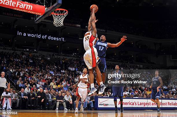 Reggie Williams of the Golden State Warriors goes to the hoop past Ronnie Price of the Utah Jazz at Oracle Arena on April 13, 2010 in Oakland,...