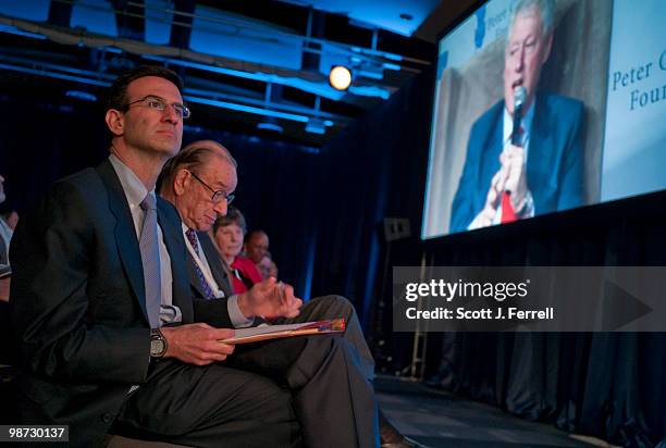 April 28: Office of Management and Budget Director Peter Orszag and former Federal Reserve Chairman Alan Greenspan look on as former President Bill...