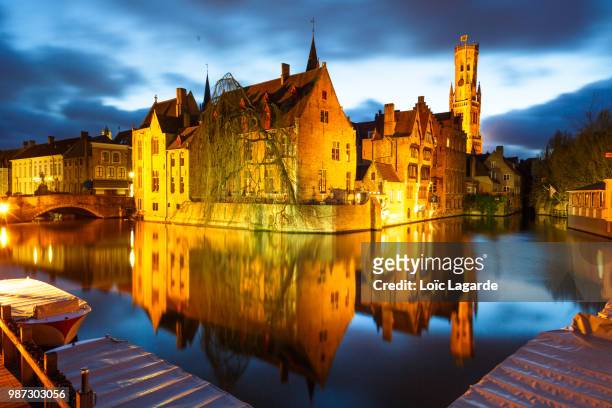 brugge by night - bruges night stock pictures, royalty-free photos & images