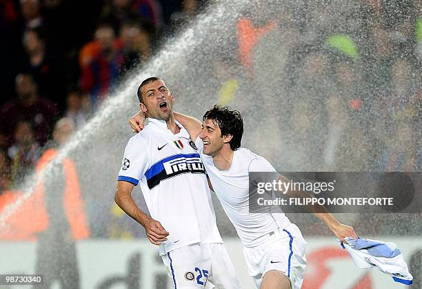 Inter Milan's Argentinian forward Alberto Milito Diego and Argentinian defender Walter Andrian Samuel celebrate after winning the UEFA Champions...