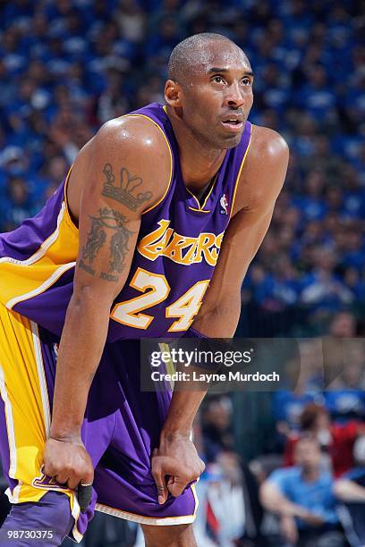 Kobe Bryant of the Los Angeles Lakers rests on the court against the Oklahoma City Thunder in Game Three of the Western Conference Quarterfinals...