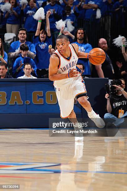 Russell Westbrook of the Oklahoma City Thunder dribbles the ball downcourt against Los Angeles Lakers in Game Three of the Western Conference...