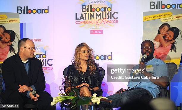 Of Western Union Jeff Herrera, singer Paulina Rubio and musician Wyclef Jean speak at a press conference for Western Union "Returns The Love" at the...