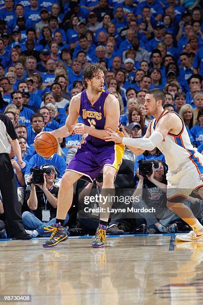 Pau Gasol of the Los Angeles Lakers looks to move the ball against the Oklahoma City Thunder in Game Three of the Western Conference Quarterfinals...