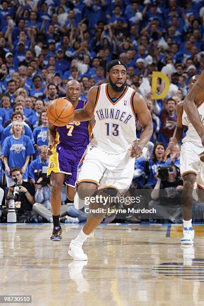 James Harden of the Oklahoma City Thunder dribbles the ball downcourt against Los Angeles Lakers in Game Three of the Western Conference...