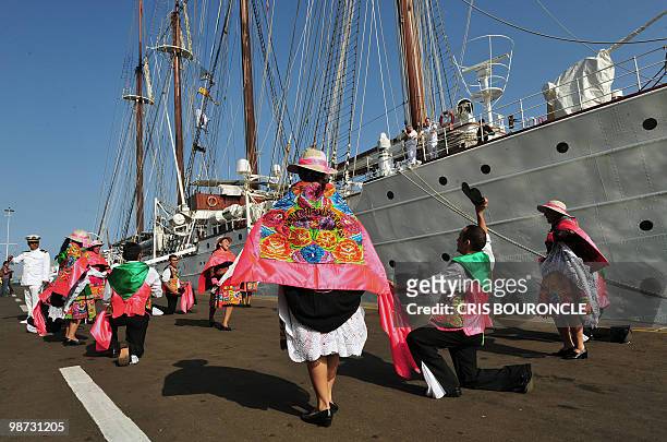 Peruvian dancers perform a typical Andean dance for the Spanish cadets on the Spaniard sailboat Sebastian Elcano, after they moored at the Callao...