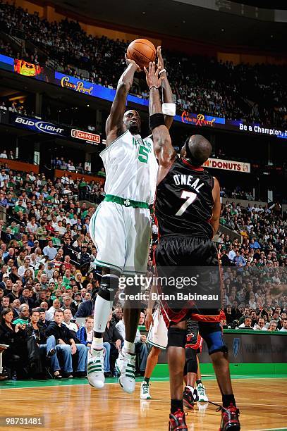 Kevin Garnett of the Boston Celtics goes up for a shot against Jermaine O'Neal of the Miami Heat in Game Five of the Eastern Conference Quarterfinals...