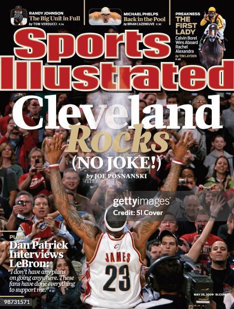 May 25, 2009 Sports Illustrated via Getty Images Cover: Basketball: Cleveland Cavaliers LeBron James claps powder in front of the fans before game vs...