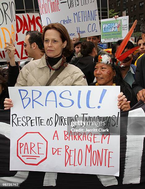 Sigourney Weaver and Manuela Omari Ima Omene of the Huaorani protest the construction of the Belo Monte Dam in Brazil in front of the Brazilian...