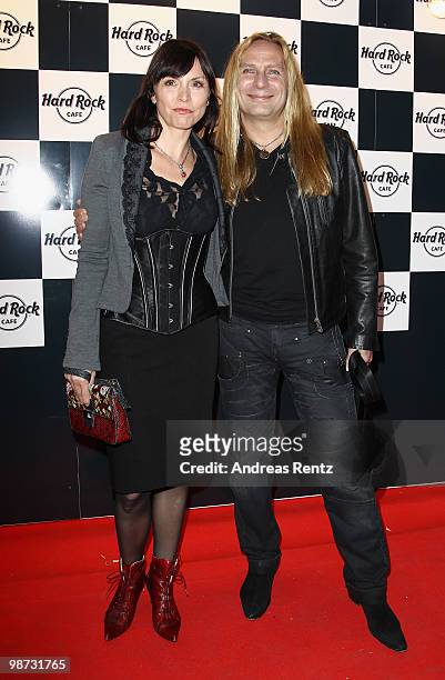 Uwe Hassbecker, guitarist of the band Silly, with partner Utah attend the Hard Rock Cafe Berlin re-opening on April 28, 2010 in Berlin, Germany.