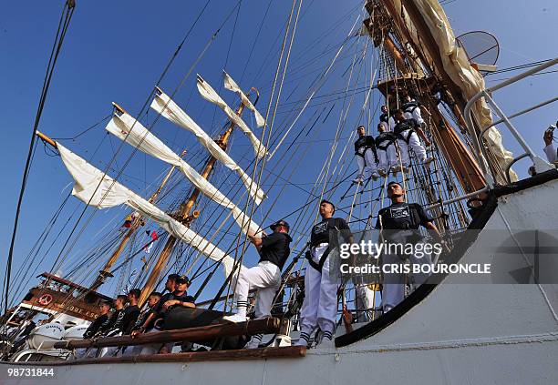 Ecuadorean cadets aboard their sailboat Guayas, stand on the riggings after mooring at the Callao Naval Base in Peru, on April 28, 2010. Eleven...