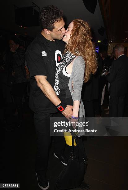 Singer 'Evil' Jared Hennagan and partner Sina-Valeska Jung attend the Hard Rock Cafe Berlin re-opening on April 28, 2010 in Berlin, Germany.