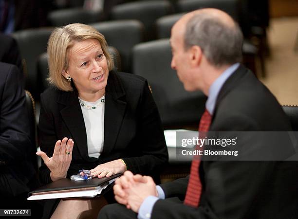 Mary Schapiro, chairman of the U.S. Securities and Exchange Commission , left, and Gary Gensler, chairman of the Commodity Futures Trading Commission...