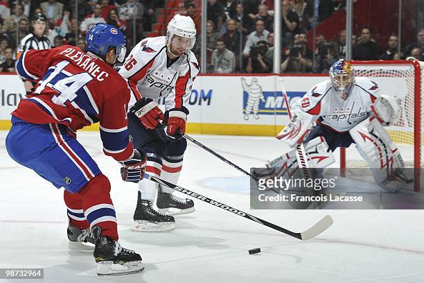 Tomas Plekanec of Montreal Canadiens attempts to take a shot on Semyon Varlamov of the Washington Capitals in Game Six of the Eastern Conference...