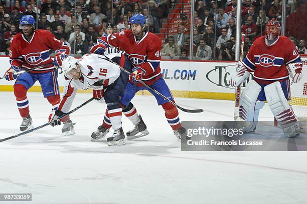 Roman Hamrlik of Montreal Canadiens clears the front of the net in Game Six of the Eastern Conference Quarterfinals during the 2010 NHL Stanley Cup...