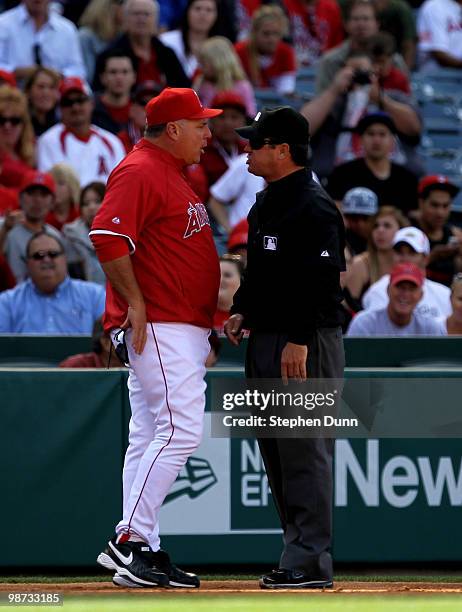 Manager Mike Scioscia of the Los Angeles Angels of Anaheim argues with third base umpire Rob Drake after Drake ejected him in the game with the...