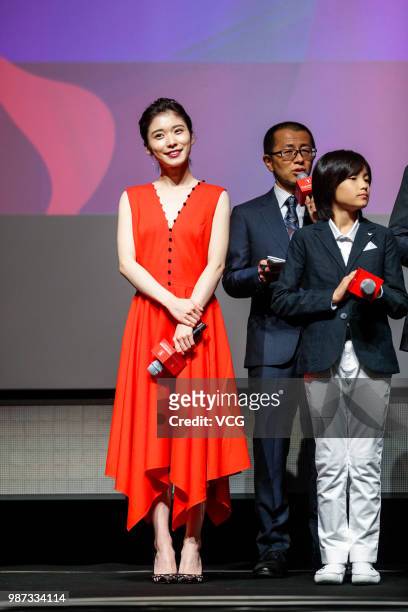 Japanese actress Mayu Matsuoka and Japanese actor Kairi Jo attend a meeting of film 'Shoplifters' during the 21st Shanghai International Film...