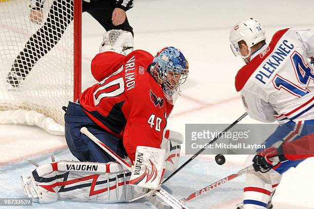 Semyon Varlamov of the Washington Capitals makes a save on shot by Tomas Piekarec against the Montreal Canadiens during Game Seven of the Eastern...