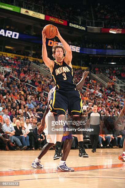 Troy Murphy of the Indiana Pacers rebounds against the Phoenix Suns in an NBA Game on March 6, 2010 at U.S. Airways Center in Phoenix, Arizona. NOTE...