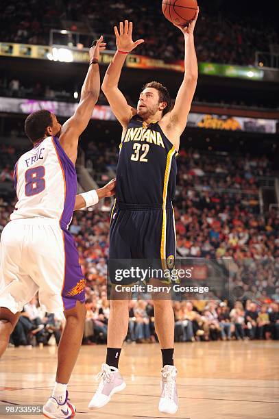 Josh McRoberts of the Indiana Pacers looks to take a shot against Channing Frye of Phoenix Suns in an NBA Game on March 6, 2010 at U.S. Airways...