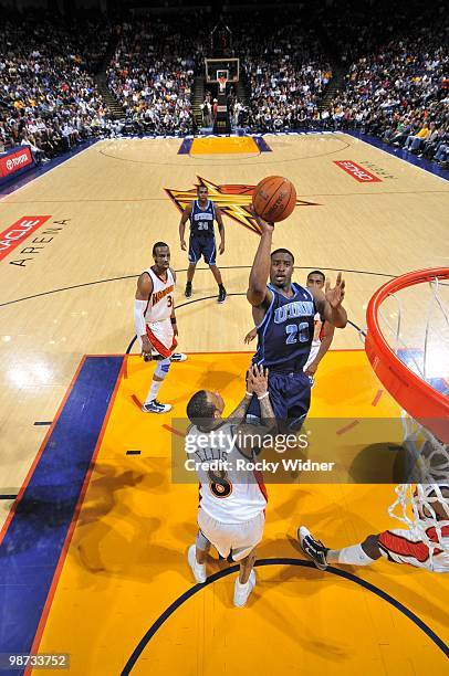 Wesley Matthews of the Utah Jazz goes to the hoop over Monta Ellis of the Golden State Warriors at Oracle Arena on April 13, 2010 in Oakland,...