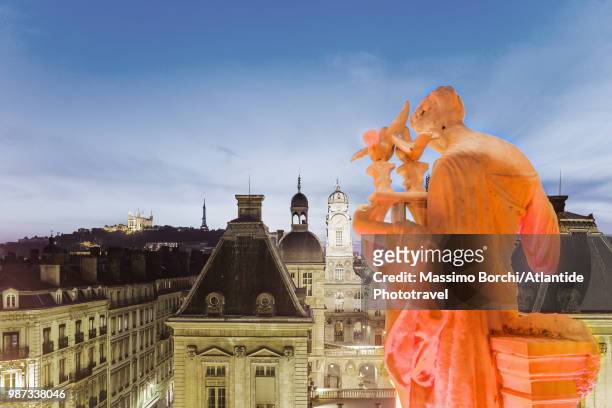 the statues on the terrace of the opéra nouvel (nouvel opera house), on the background the town and some buildings of place de la comédie - nouvel an stock pictures, royalty-free photos & images