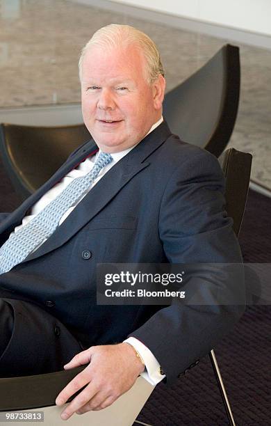 Michael "Mike" Smith, chief executive officer of Australia & New Zealand Banking Group Ltd. , poses for a photograph during an interview in Sydney,...